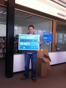 Nation Hahn modeling the Vote Against Amendment One campaign sign.